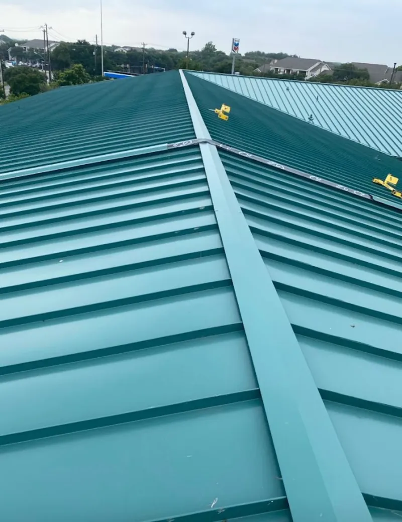 Green commercial metal roof ridge and valley for Metal Roof Repair in Pilot Point